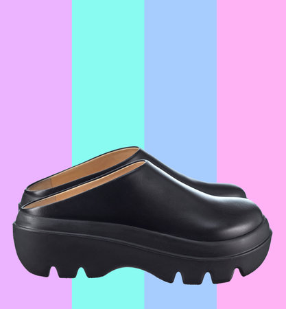 Gorgeous pair of summer shoes with open heels, made of black leather, with a shock-absorbing rubber...