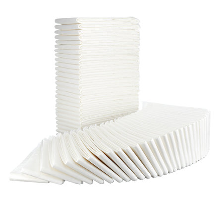 Disposable diapers are white, new, stacked in two neat large piles - vertical and fan-shaped, isolated on a white background.の写真素材