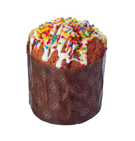 Easter cake, covered with icing and colored sprinkles on top, wrapped in traditional paper, isolated on a white background.の写真素材