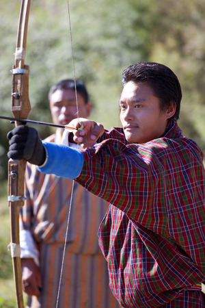 Bumthang Valley, Bhutan - October, 2008: Archery is the national sport of Bhutan since 1971 when Bhutan joined the United Nations.のeditorial素材