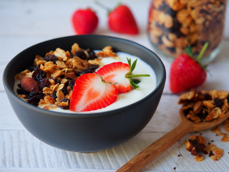 Homemade granola yogurt and strawberry for healthy breakfastの写真素材