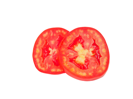 Fresh slice tomato isolated on white background with clipping pathの写真素材