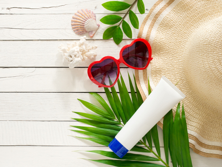 Summer holiday  items,Beach accessories on white wooden background with copy space for vacation concept.の写真素材