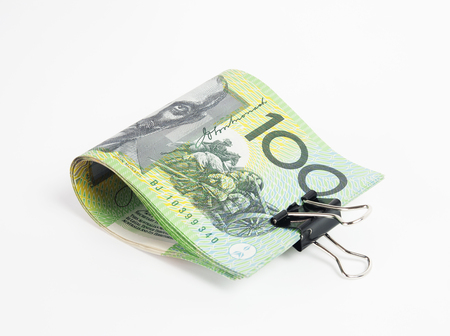 Australia banknotes with money clip on white background.の写真素材