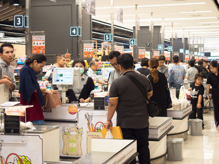 Bangkok,Thailand - July 29,2017, Customer doing payment at cashier for shopping at Tops supermarket in Centralplaza Bangna.のeditorial素材