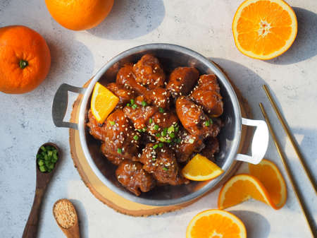 Orange chicken, Deep fried chicken breast with orange juice sauce.の写真素材