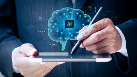 Artificial intelligence (AI) and machine learning concept. Businessman using tablet computer to connect with AI.の写真素材