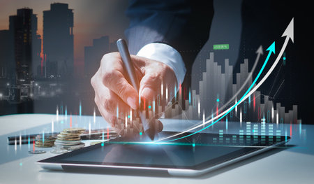 Stock market trading and money investment concept, Businessman drawing a virtual graph of stock market uptrend.の写真素材