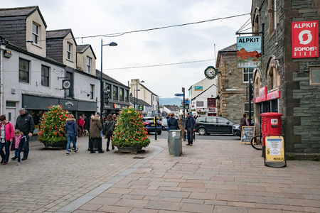 Keswick Cumbria UK April 15 2019 Tourists and shoppers in keswick town centreのeditorial素材