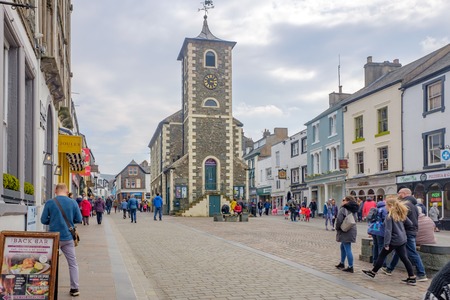 Keswick Cumbria UK April 15 2019 Tourists and shoppers in keswick town centreのeditorial素材