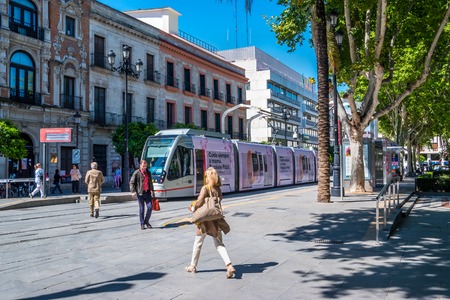 Seville, Spain may 8th 2019 Modern tram approaching stop in downtown of Seville.のeditorial素材