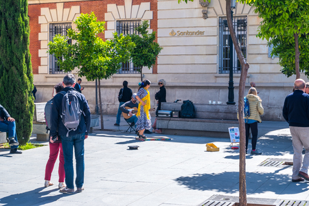 Sevilla, Spain May 8th 2019 2019. , a street band and flamenco dancer on the square of Spain, Seville.のeditorial素材