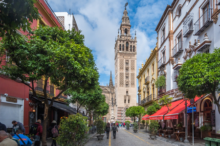 SEVILLE, SPAIN - May 8th 2019- Tourists relaxing at a pavement cafe in the city centre, Seville, Seville Province,のeditorial素材