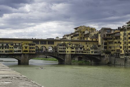 The unusual and strange Ponte Vecchio in Florence Italyの写真素材