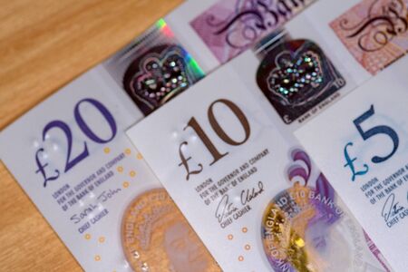 uk twenty pound notes trapped in mousetrapの写真素材
