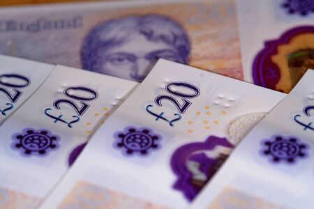 uk twenty pound notes trapped in mousetrapの写真素材