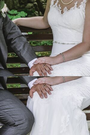 Young married couple holding hands, ceremony wedding dayの写真素材