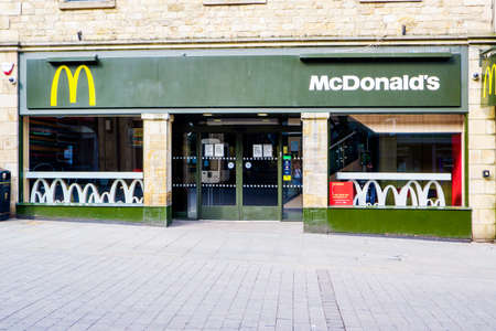 UNITED KINGDOM, LANCASTER - 9TH APRIL 2020 Exterior of shop during lockdown for Covid 19 Virusのeditorial素材