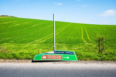 Knocked over and abandoned road sign UKの写真素材