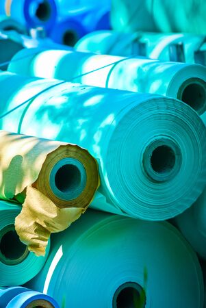 rolls of blue medical paper at a paper mill UKの写真素材