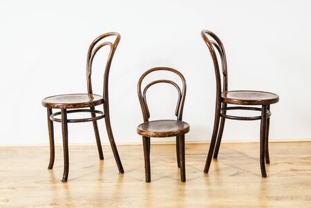 two large and one childs chair in an empty room UKの写真素材