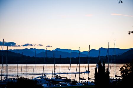 Mast of Boats at Low Wood Bay Windermere Cumbria at sunsetの写真素材