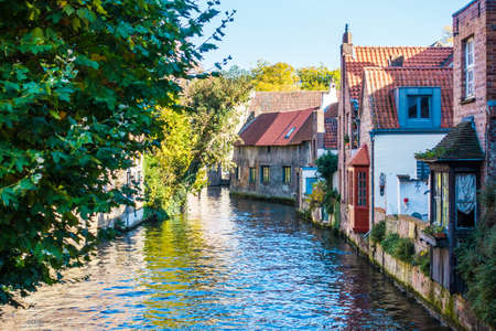 Belguim Bruges 30th October 2016 Canal and medieval houses. Bruges Bruggeのeditorial素材