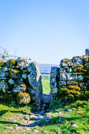 stile in old dry stone wall on the beetham trailの写真素材
