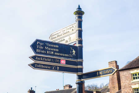 UK Ironbridge March 3 2016 Tourist direction signposts pointing in various directions