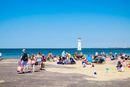 New Brighton UK June 6 2016 Families on the beach at New Brightonのeditorial素材