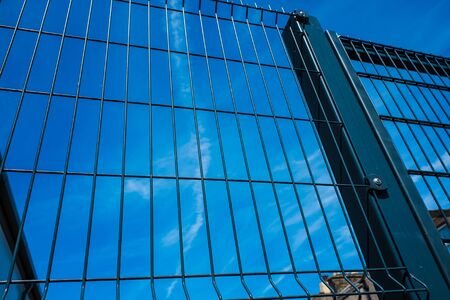 Black metal security gates protecting business propertyの写真素材