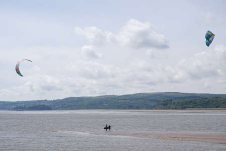 Arnside UK 24 May 2020 Kite Surfers at Arnside on a very windy dayのeditorial素材