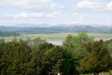 Morecambe Bay Esturary from Arnside Knott with trees in foregroundの写真素材