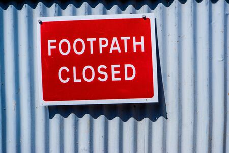 footpath closed red warning sign in Kendal UKの写真素材