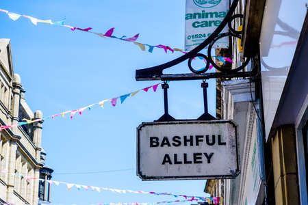 Lancaster UK May 30 2020 An ornate street sign for Bashful Alley in the historic town.のeditorial素材