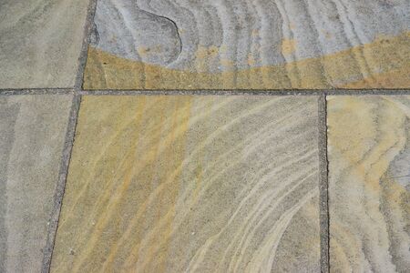 Brown ceramic floor tiles closeup textureの写真素材