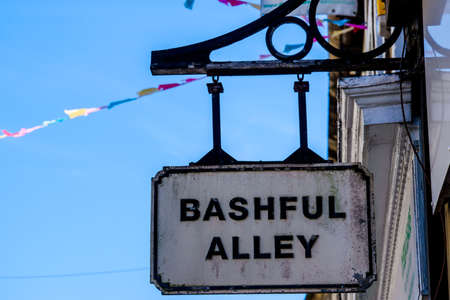 Lancaster UK May 30 2020 An ornate street sign for Bashful Alley in the historic town.のeditorial素材