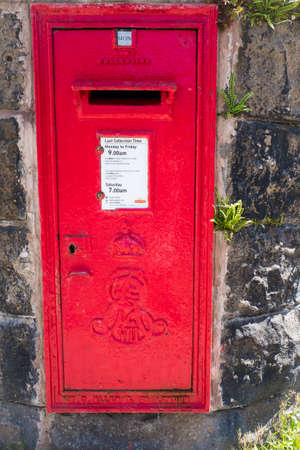 Lancaster UK 30 May 2020 English post box in a stone wallのeditorial素材