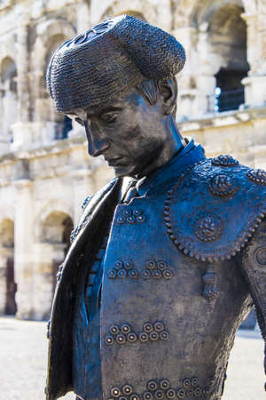 A statue of a matador outside Nimes Colosseum in southern France.のeditorial素材
