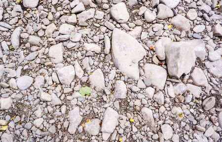 Naturally polished river washed rocks and pebblesの写真素材