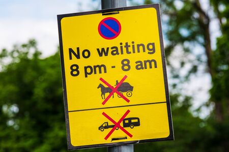 Road sign No stopping, no waiting, sign on metal poleの写真素材