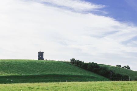 St Anthony Tower Milnthopre with open fields and blue skyの写真素材