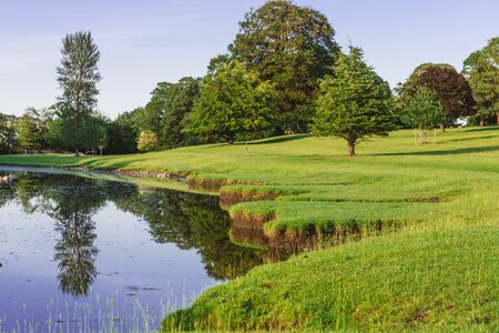 a bend in the River Bela at Dallam Park, Milnthorpe, Cumbria, UKの写真素材