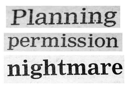 Distressed Planning Permission text on plain white backgroundの写真素材
