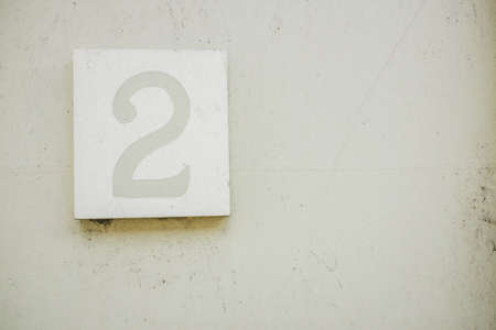 Number 2 Mounted on Doorway in grey and white UKの写真素材