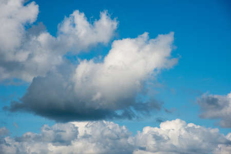 beautiful blue sky with white clouds in autumn UKの写真素材