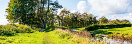 View of an English rural countryside scenery on British waterwayの写真素材
