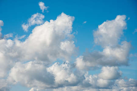 beautiful blue sky with white clouds in autumn UKの写真素材