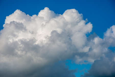 beautiful blue sky with white clouds in autumn UKの写真素材