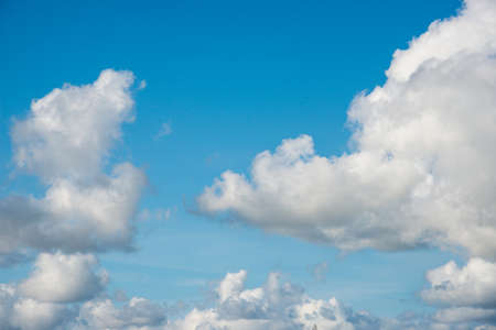 beautiful blue sky with white clouds in autumn UKの写真素材